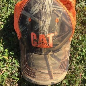 CAT camouflage and orange baseball cap.
